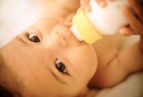 corbis_rm_photo_of_baby_with_bottle